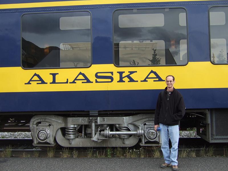 alaska068.JPG - Posing in front of the train as we arrive at the park.