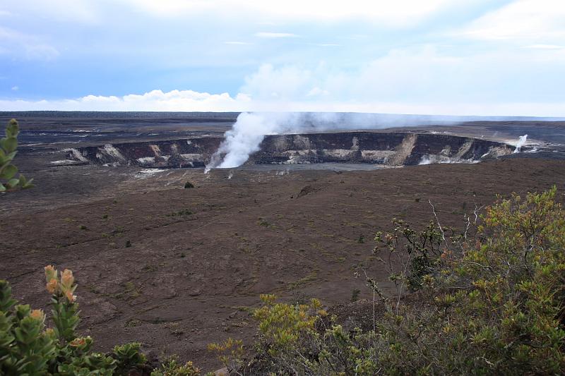 hawaii162.JPG - Day 4:  Hawai'i Volcanoes National Park.  This is the Kileaua Caldera.  The steam is from an active eruption.